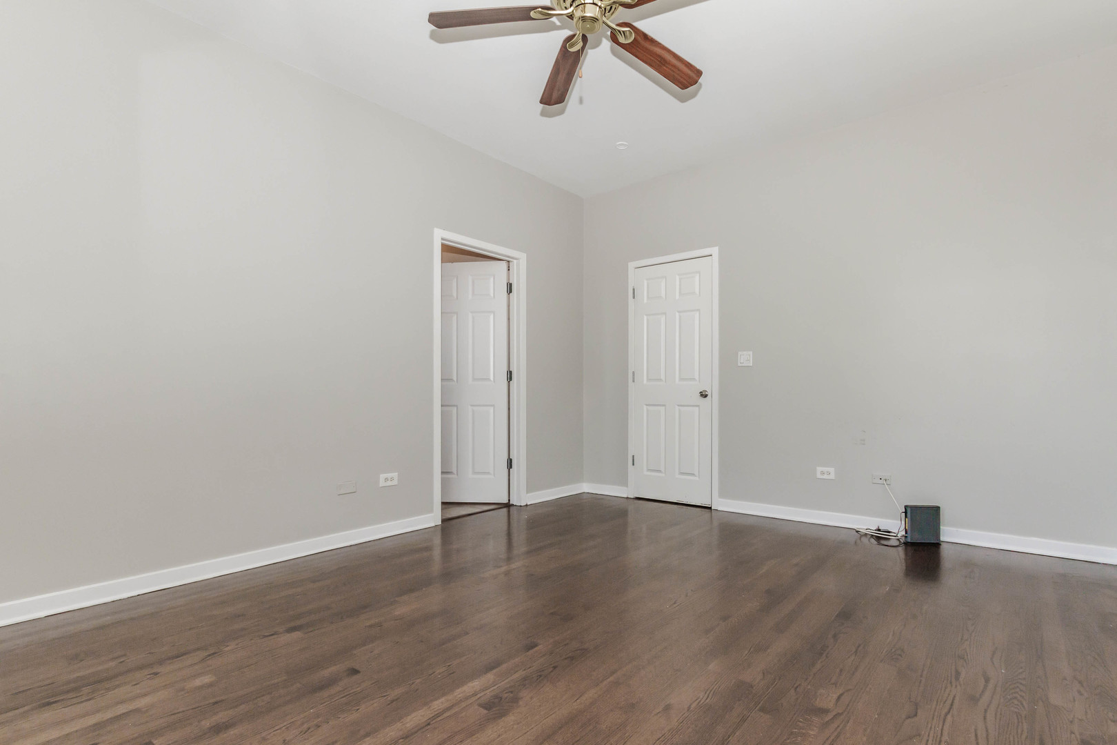 1443 West Fillmore Street Chicago, IL 60607 - Photo 23 of 37 an empty room with wooden floor and windows