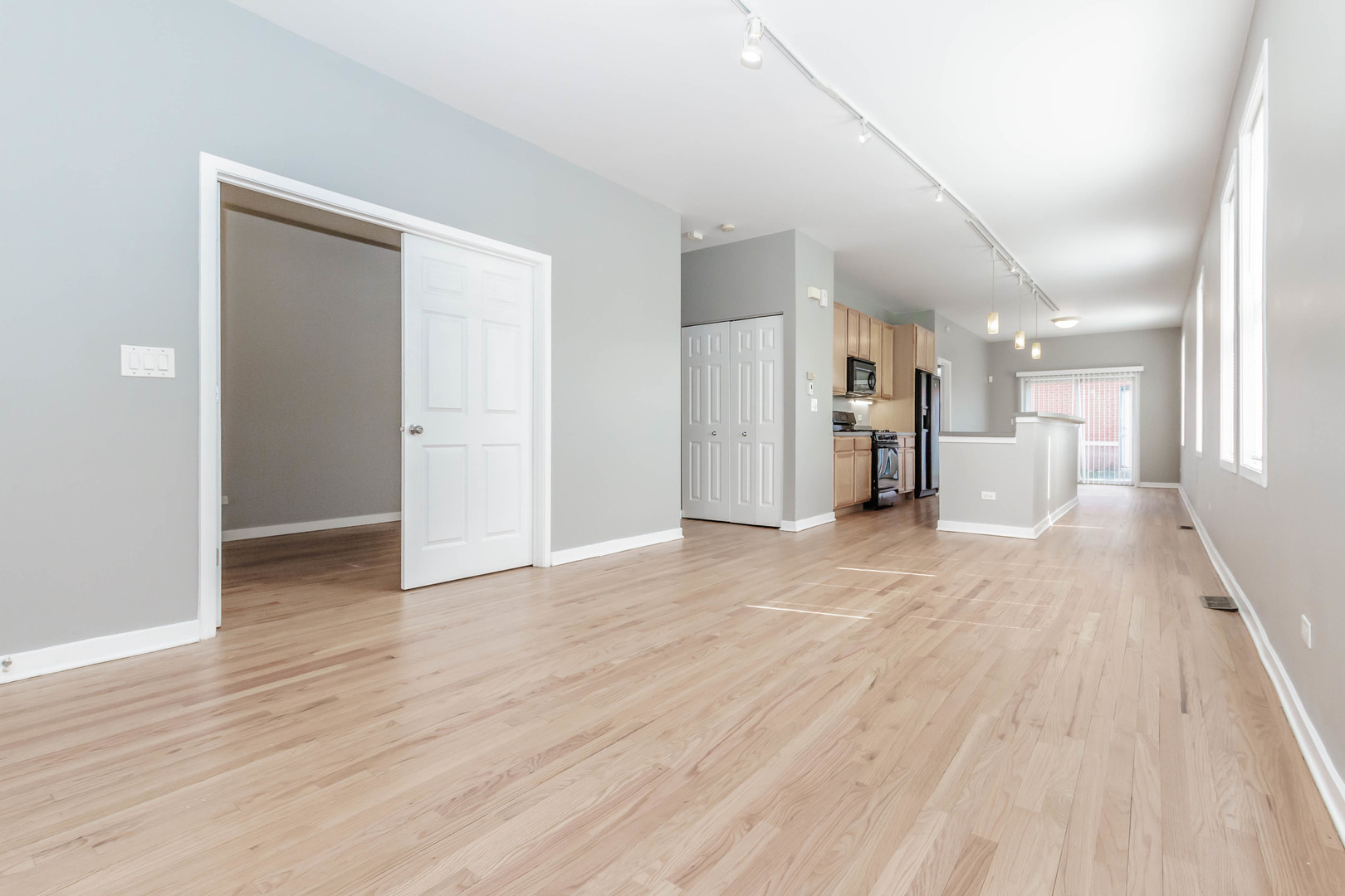 1443 West Fillmore Street Chicago, IL 60607 - Photo 5 of 37 a view of empty room with wooden floor