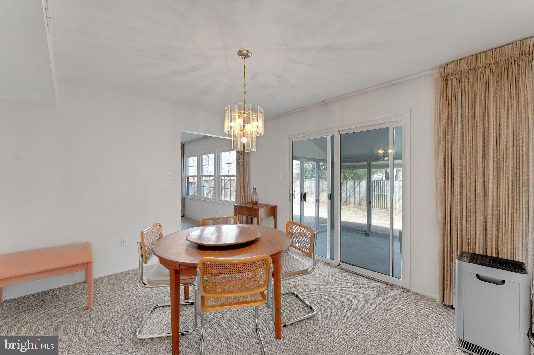 1436 Jerrold Place Crofton, MD 21114 - Photo 11 of 34 a dining room with furniture and window