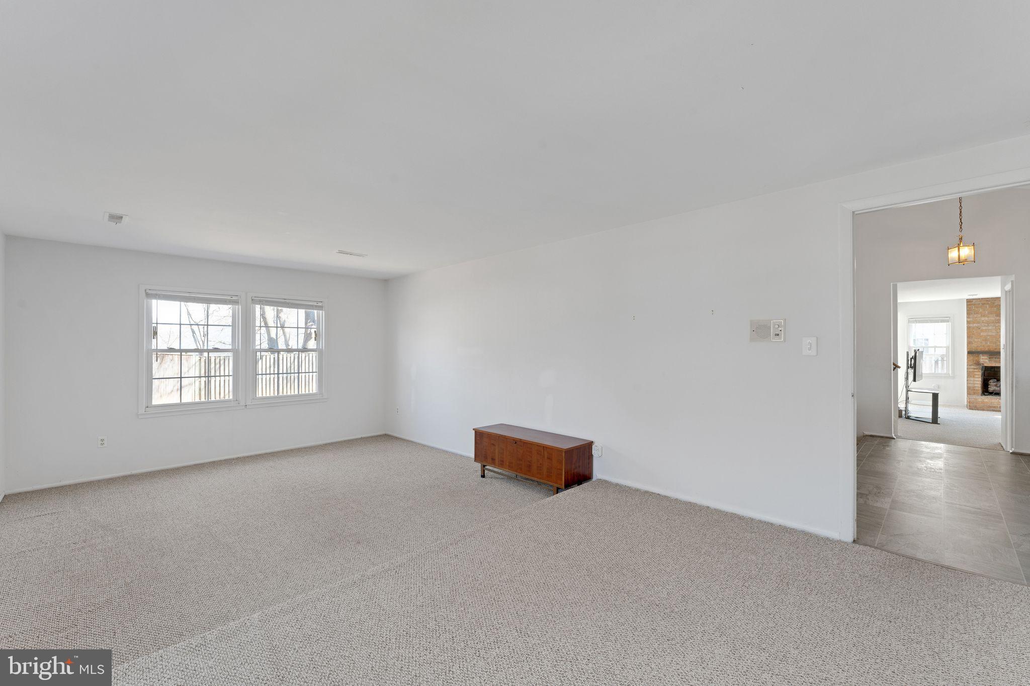 1436 Jerrold Place Crofton, MD 21114 - Photo 14 of 34 a view of an empty room with a window