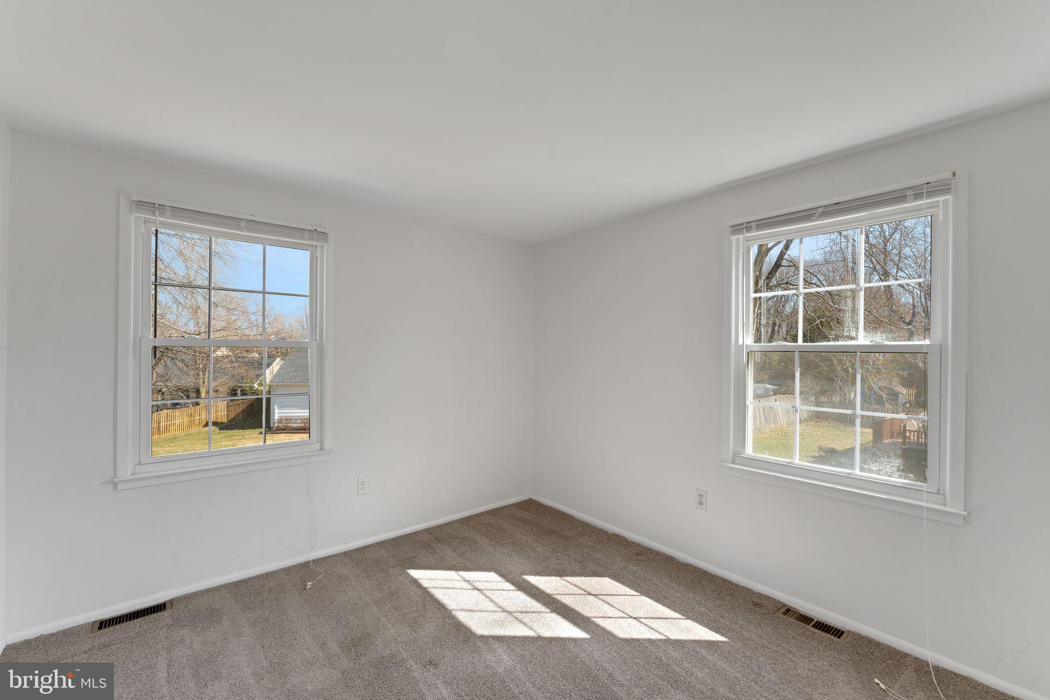 1436 Jerrold Place Crofton, MD 21114 - Photo 22 of 34 an empty room with windows