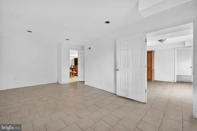 a view of an empty room and window