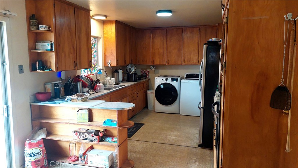 1547 Blackburn Avenue Corning, CA 96021 - Photo 16 of 51 a room with storage and utility