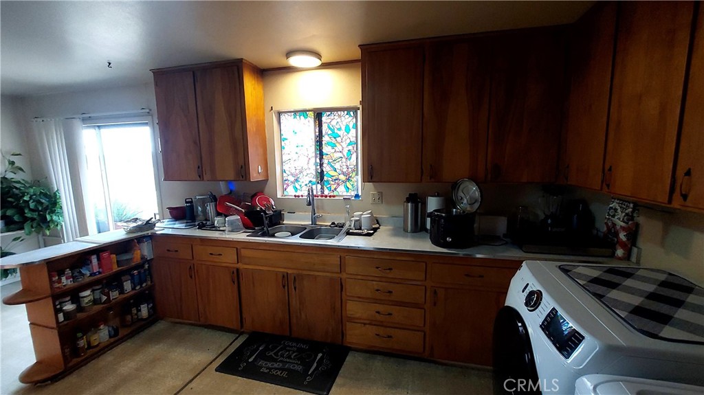 1547 Blackburn Avenue Corning, CA 96021 - Photo 19 of 51 a kitchen with a sink and cabinets