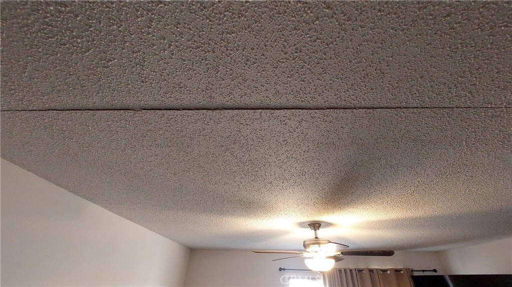 1547 Blackburn Avenue Corning, CA 96021 - Photo 23 of 51 a lamp is sitting on a shelf in a room