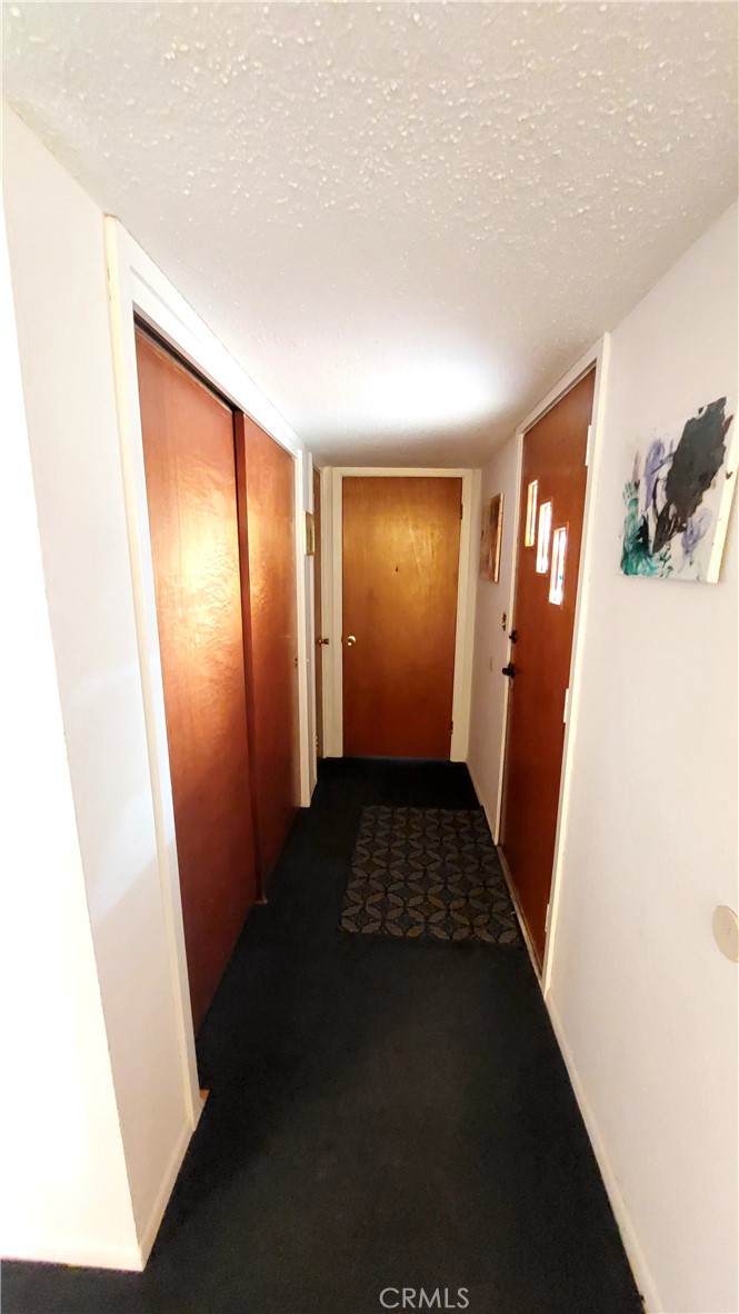 1547 Blackburn Avenue Corning, CA 96021 - Photo 27 of 51 a view of hallway with furniture and a window