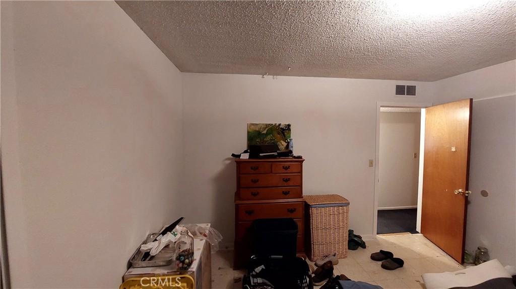 1547 Blackburn Avenue Corning, CA 96021 - Photo 37 of 51 a bathroom with a toilet and a vanity