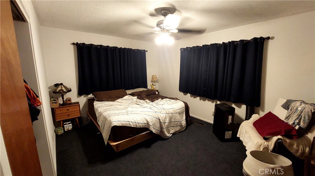 1547 Blackburn Avenue Corning, CA 96021 - Photo 39 of 51 a bedroom with a bed and a closet