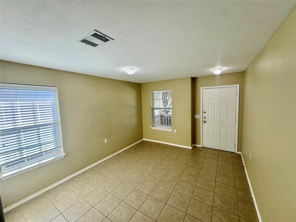 7812 Duber Lane Austin, TX 78747 - Photo 4 of 15 a view of livingroom with window