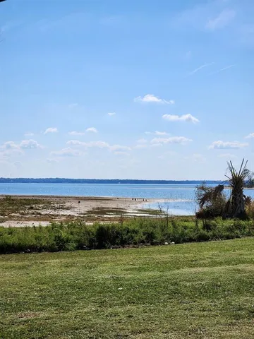 a view of a ocean with a beach
