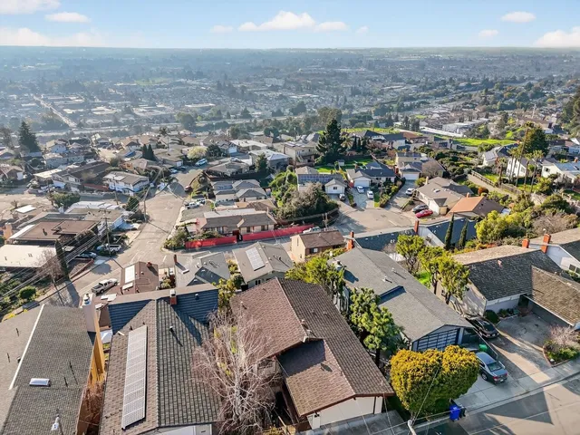 an aerial view of a city with lots of residential buildings
