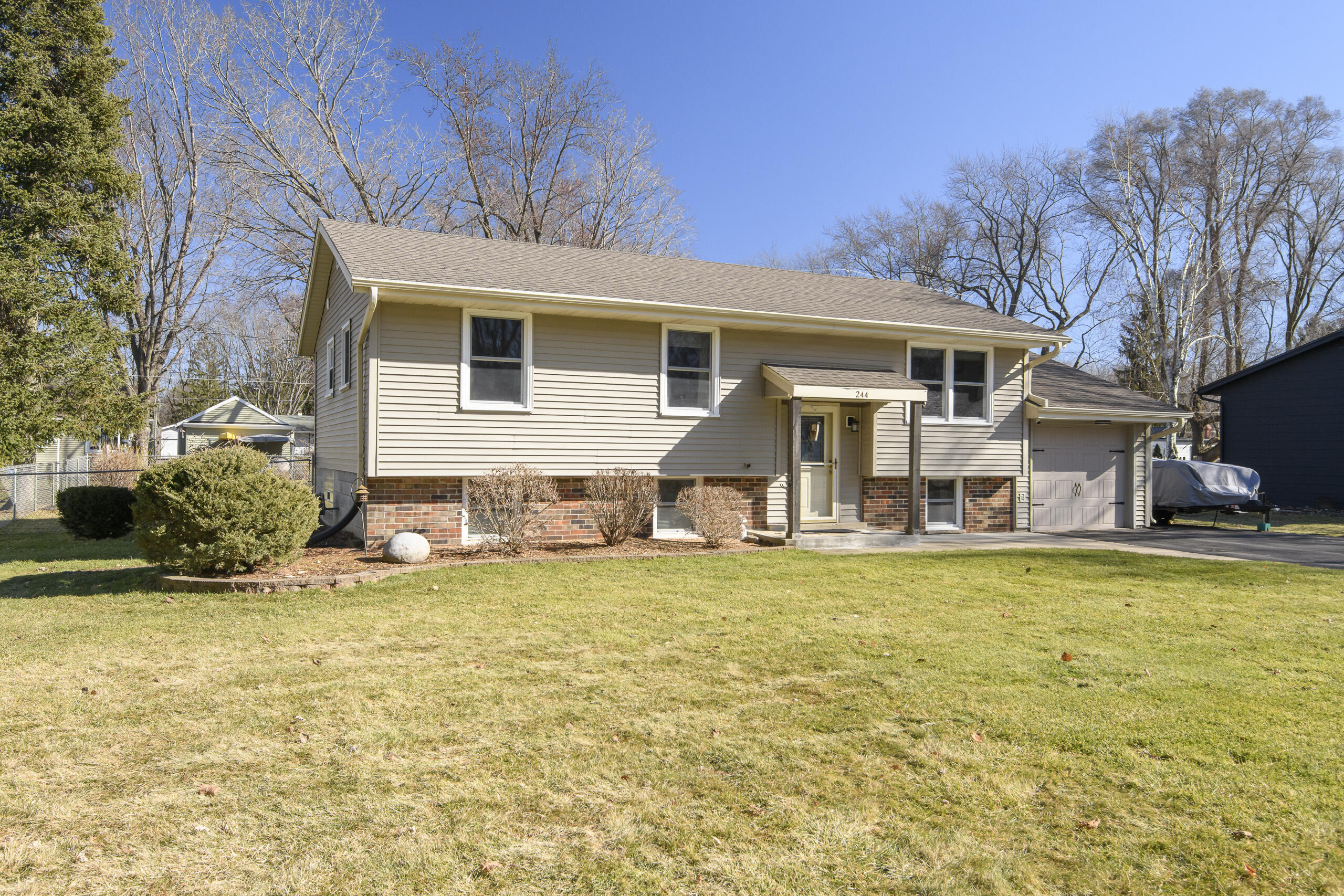 244 Edwards Street Dousman, WI 53118 - Photo 25 of 32 Good curb appeal