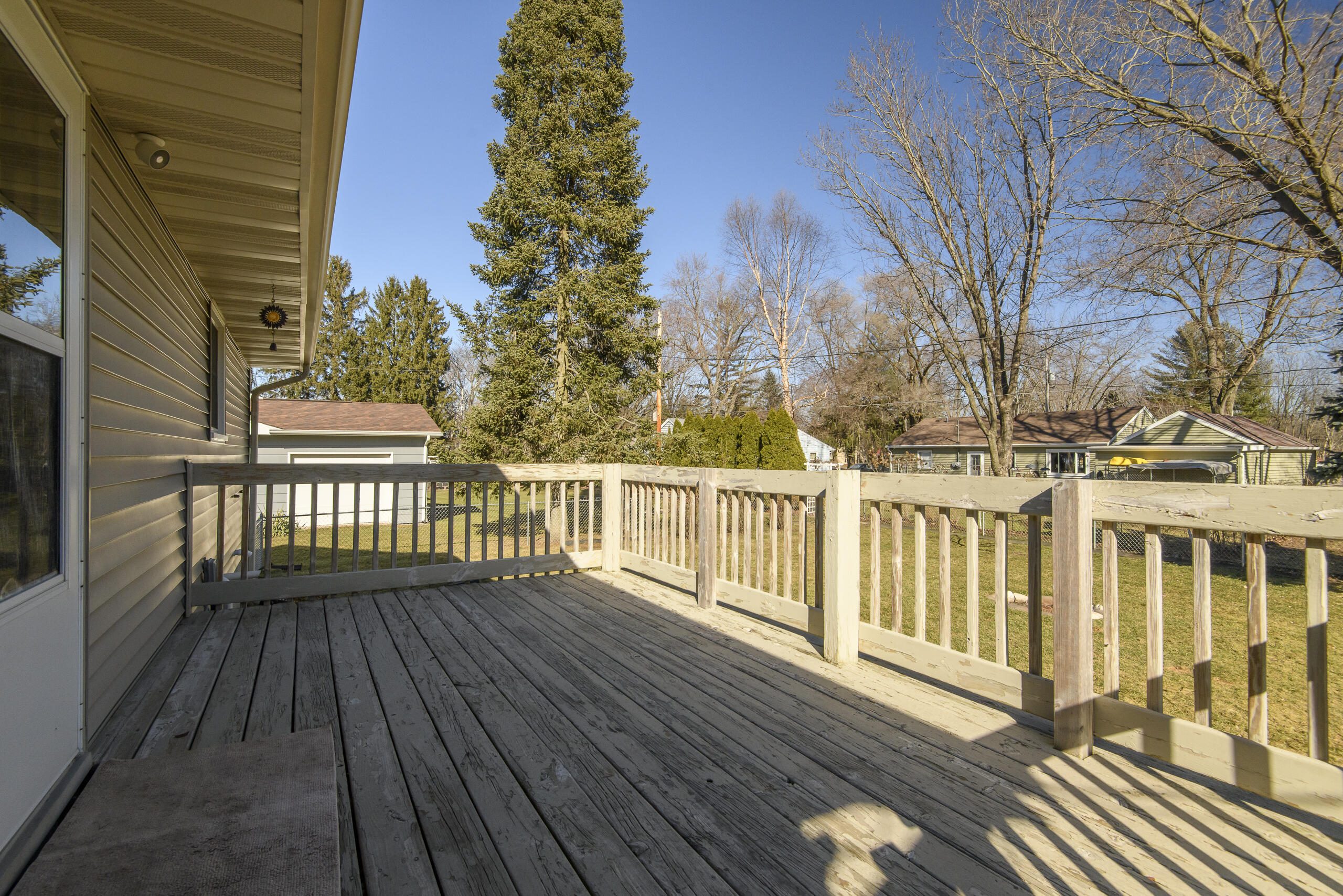 244 Edwards Street Dousman, WI 53118 - Photo 27 of 32 Large deck for outdoor entertaining