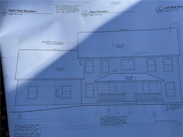 a view of backyard with green space