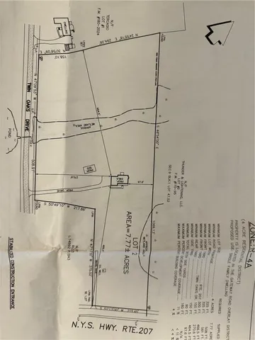 a kitchen with stainless steel appliances granite countertop a sink a stove and a wooden floors