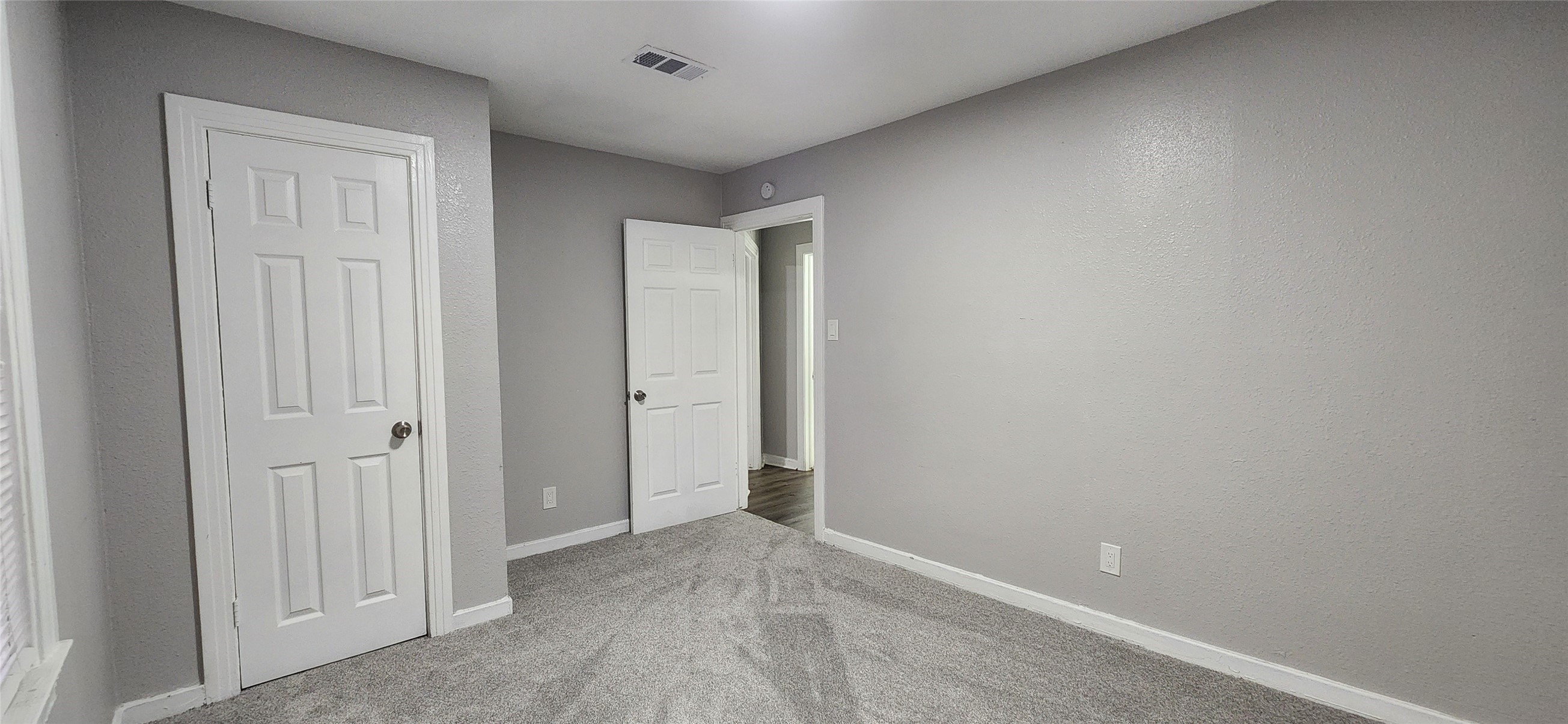 128 Huisache Street Lake Jackson, TX 77566 - Photo 17 of 23 an empty room with closet area