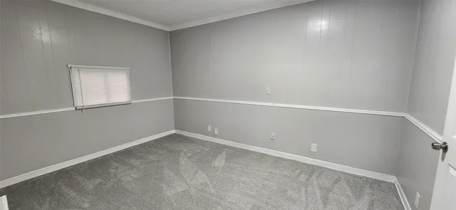 an empty room with a workbench