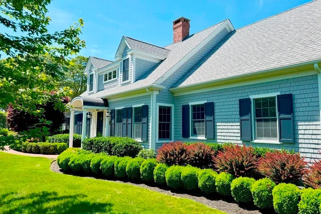 a view of a house with a garden