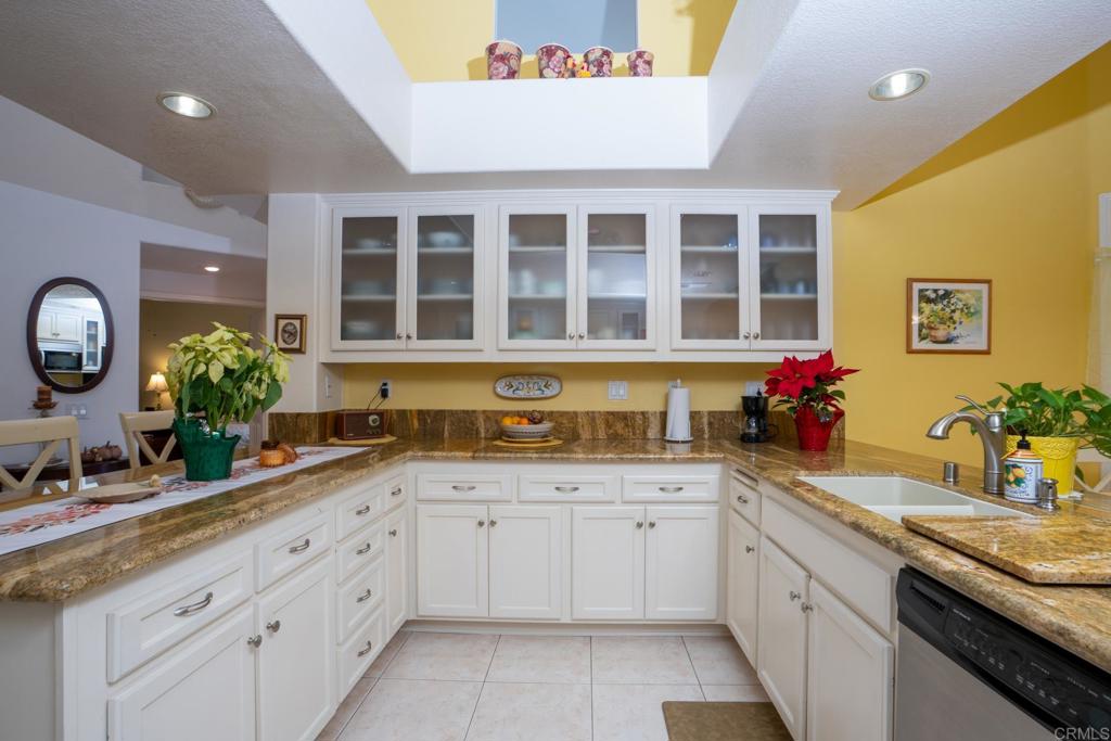 2807 Manzanita View Road Alpine, CA 91901 - Photo 12 of 36 a kitchen with a sink and cabinets