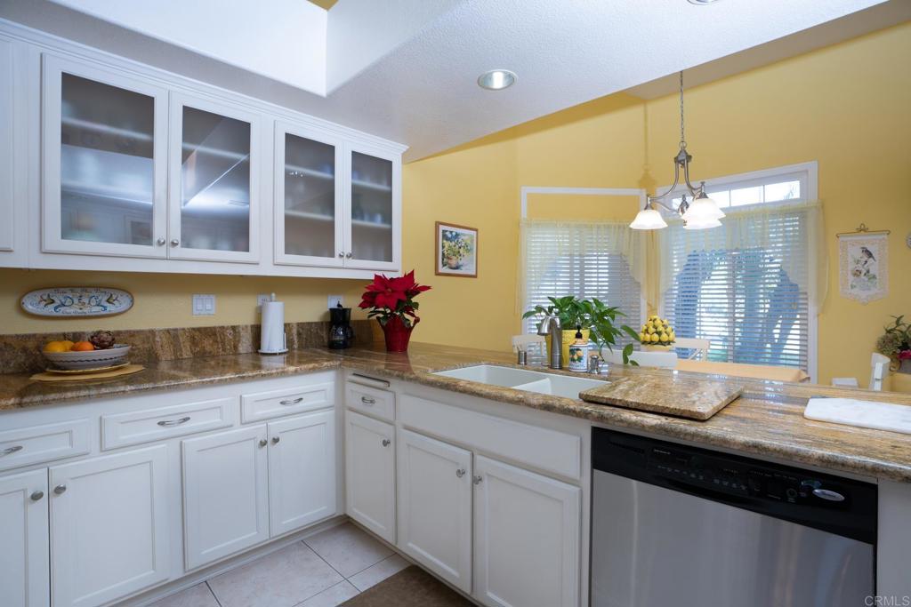 2807 Manzanita View Road Alpine, CA 91901 - Photo 13 of 36 a bathroom with a granite countertop double vanity sink a mirror and a