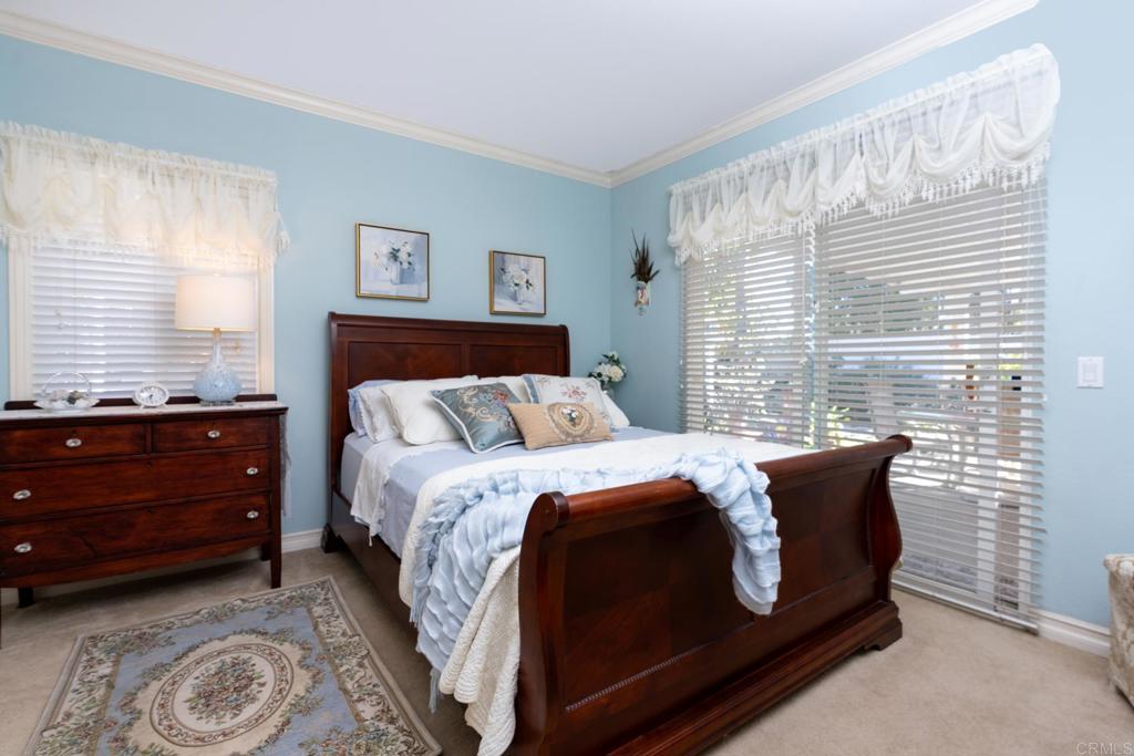 2807 Manzanita View Road Alpine, CA 91901 - Photo 17 of 36 a bedroom with a bed and a window