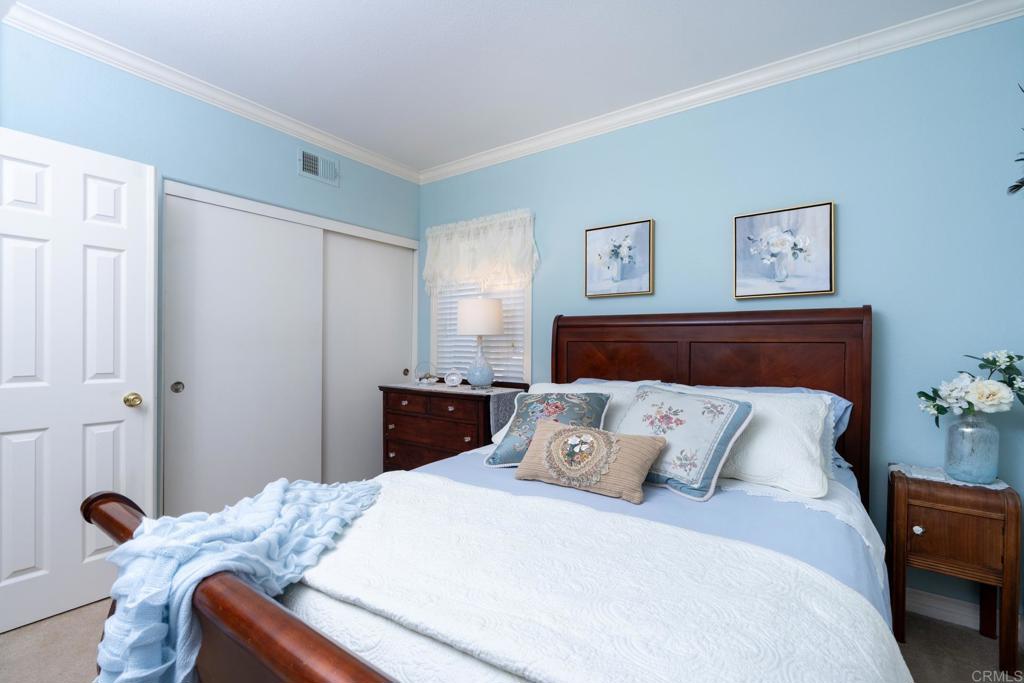 2807 Manzanita View Road Alpine, CA 91901 - Photo 18 of 36 a bedroom with a bed and wooden floor