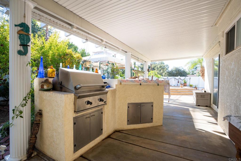 2807 Manzanita View Road Alpine, CA 91901 - Photo 28 of 36 a view of a kitchen with a stove and a large window