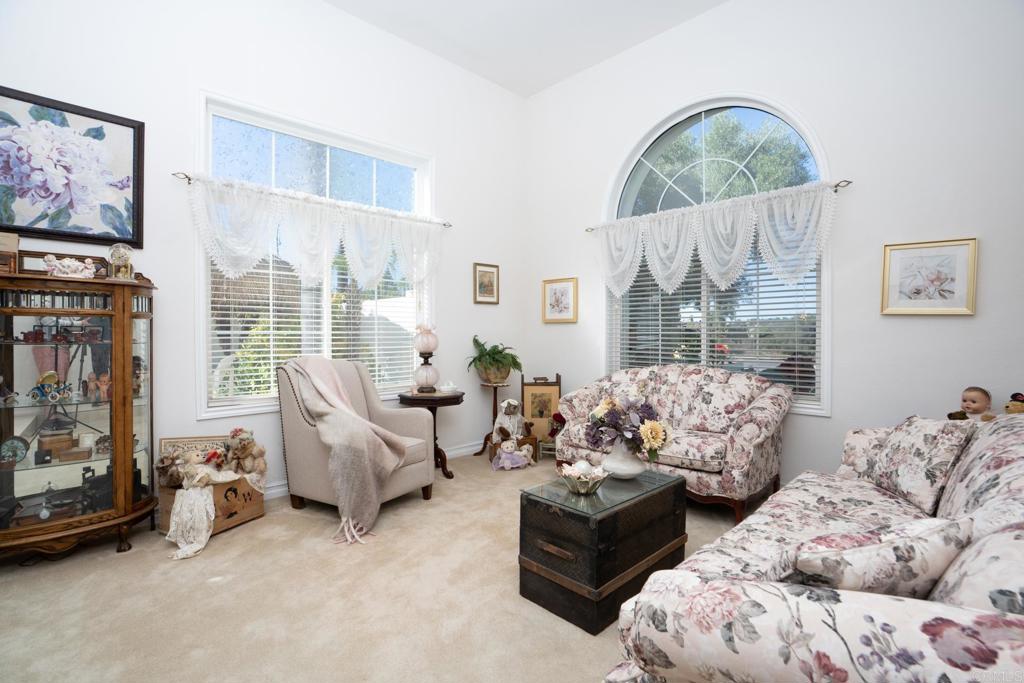 2807 Manzanita View Road Alpine, CA 91901 - Photo 4 of 36 a living room with furniture fireplace and a large window