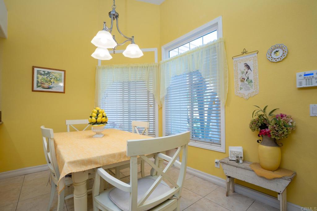 2807 Manzanita View Road Alpine, CA 91901 - Photo 10 of 36 a view of a dining room with furniture and a chandelier