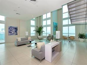 1900 North Bayshore Drive, Unit 2609 Miami, FL 33132 - Photo 24 of 36 a living room with furniture and a large window