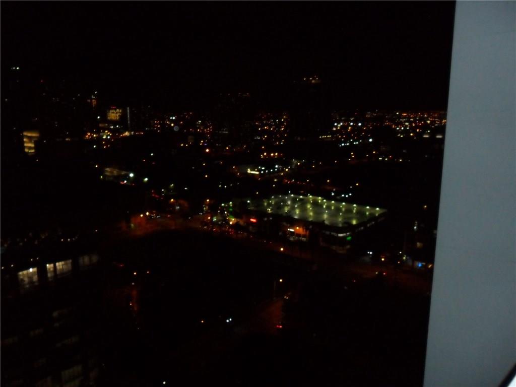 1900 North Bayshore Drive, Unit 2609 Miami, FL 33132 - Photo 28 of 36 a room that has a tree in it