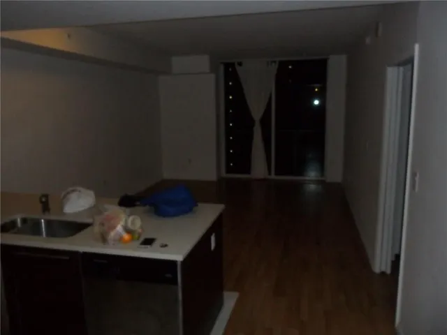 a bathroom with a shower and a toilet