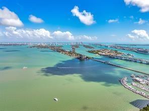 1900 North Bayshore Drive, Unit 2609 Miami, FL 33132 - Photo 6 of 36 a view of a lake with a yard