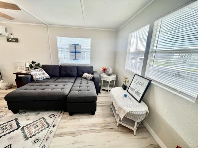 10826 Tioga Drive Port Richey, FL 34668 - Photo 23 of 59 a living room with furniture