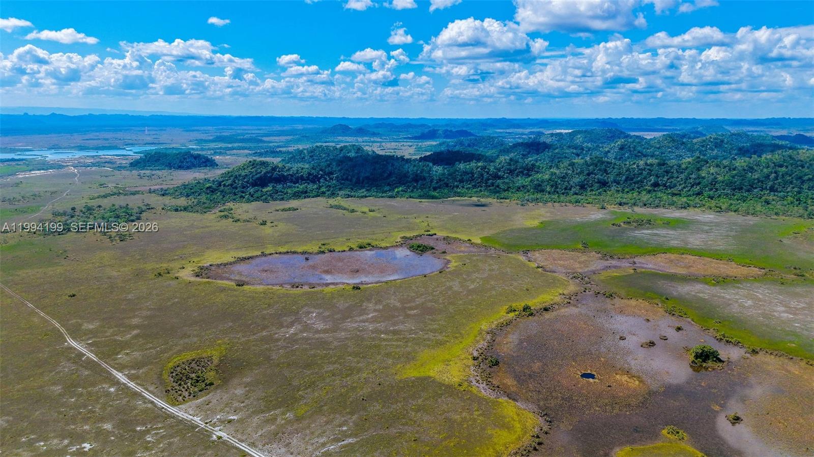 Tiger Point Tiger Point undefined, undefined 00000 - Photo 16 of 18 a view of a lake with a mountain