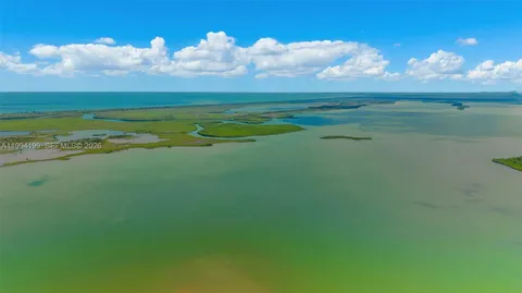 a view of an ocean and a building