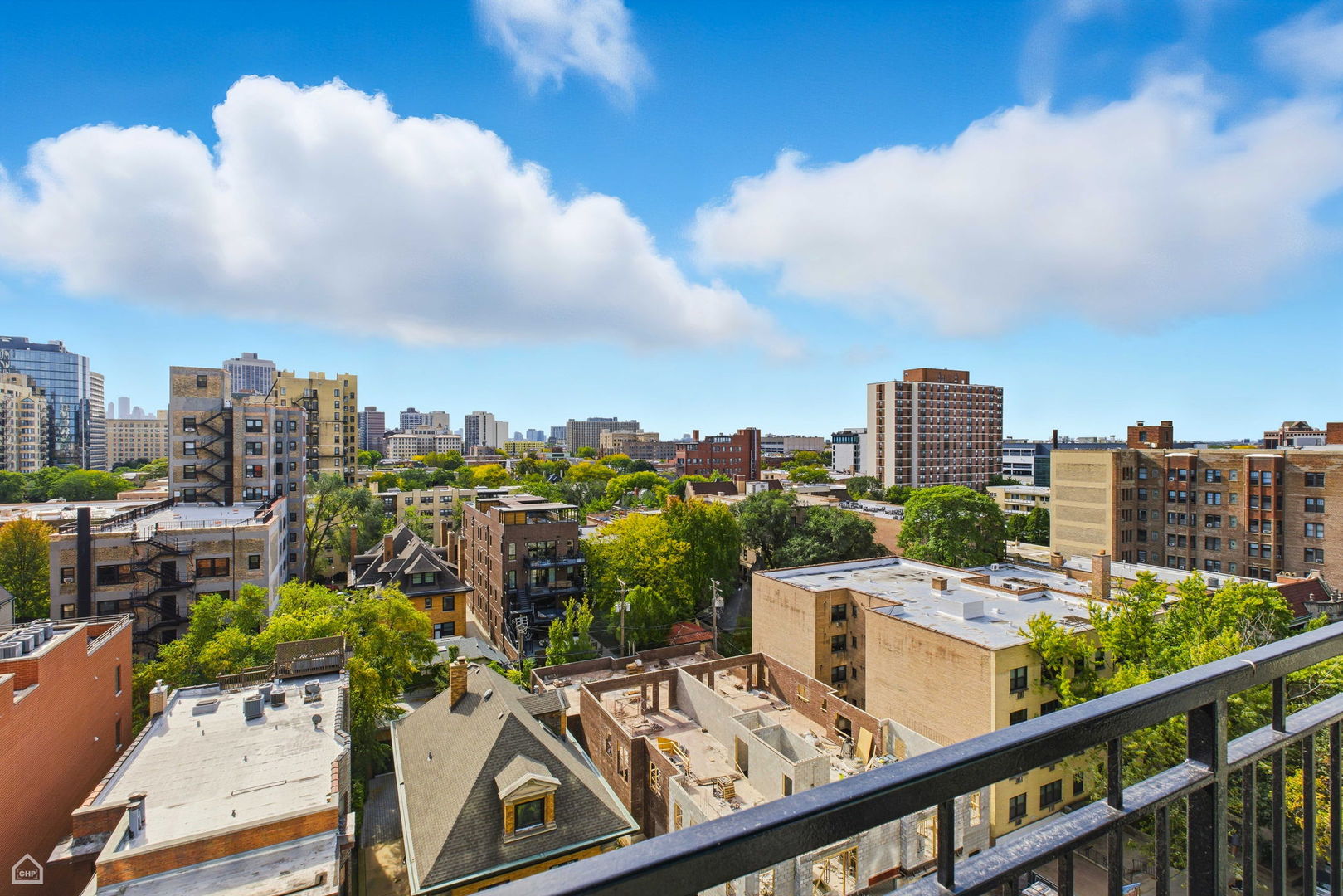 450 West Briar Place, Unit 10H Chicago, IL 60657 - Photo 11 of 17 a view of a city from a terrace