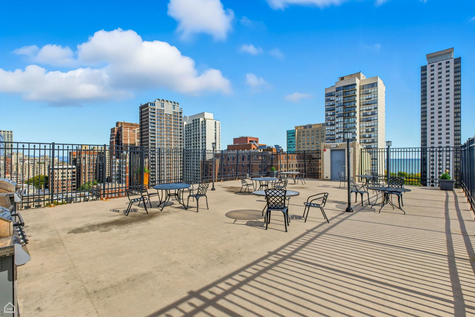 450 West Briar Place, Unit 10H Chicago, IL 60657 - Photo 14 of 17 a view of a terrace with chairs
