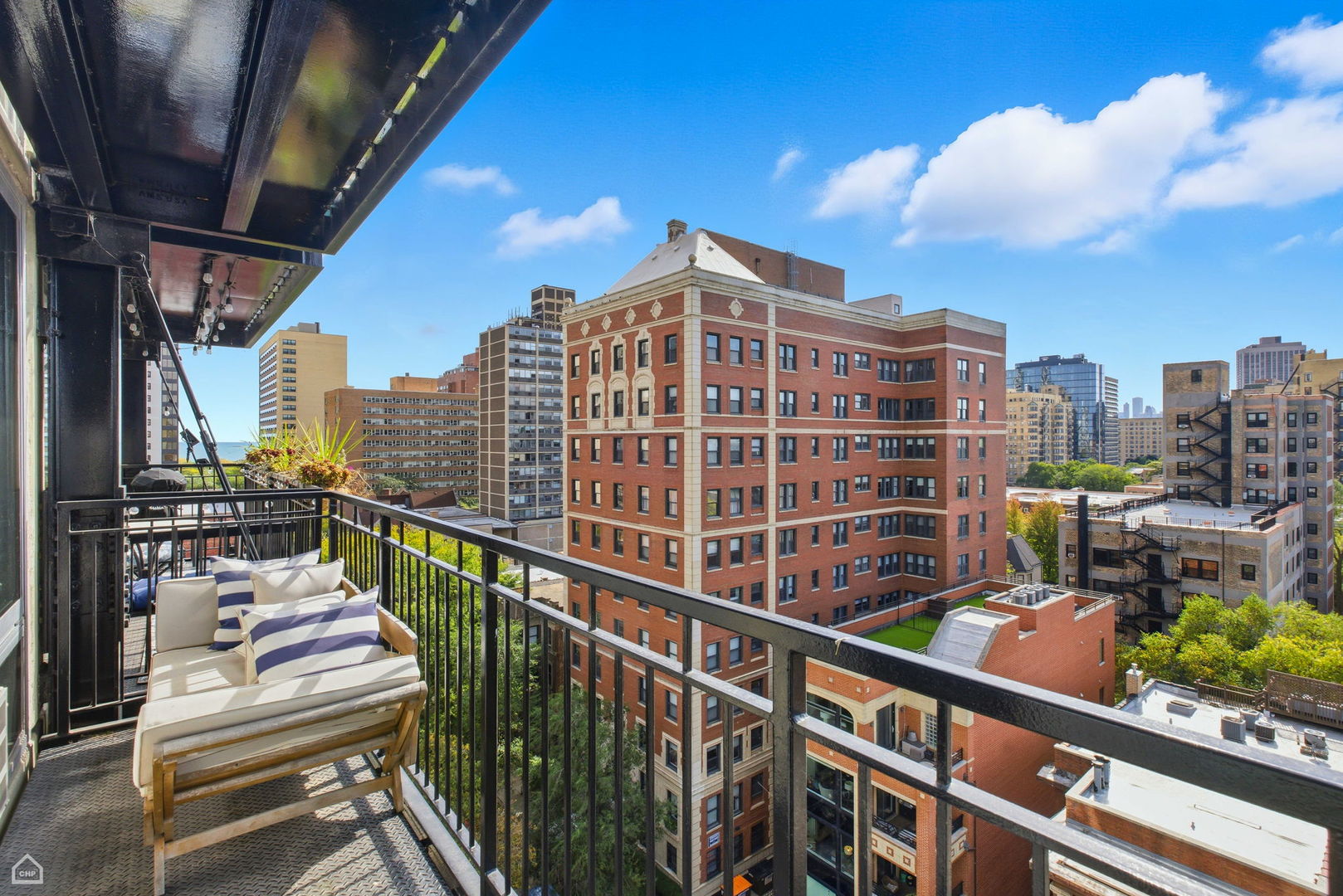 450 West Briar Place, Unit 10H Chicago, IL 60657 - Photo 10 of 17 a view of a balcony with city view