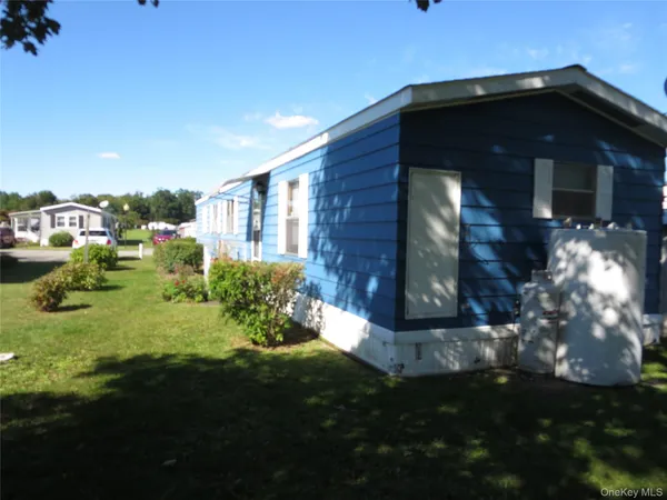 a view of a back yard of the house