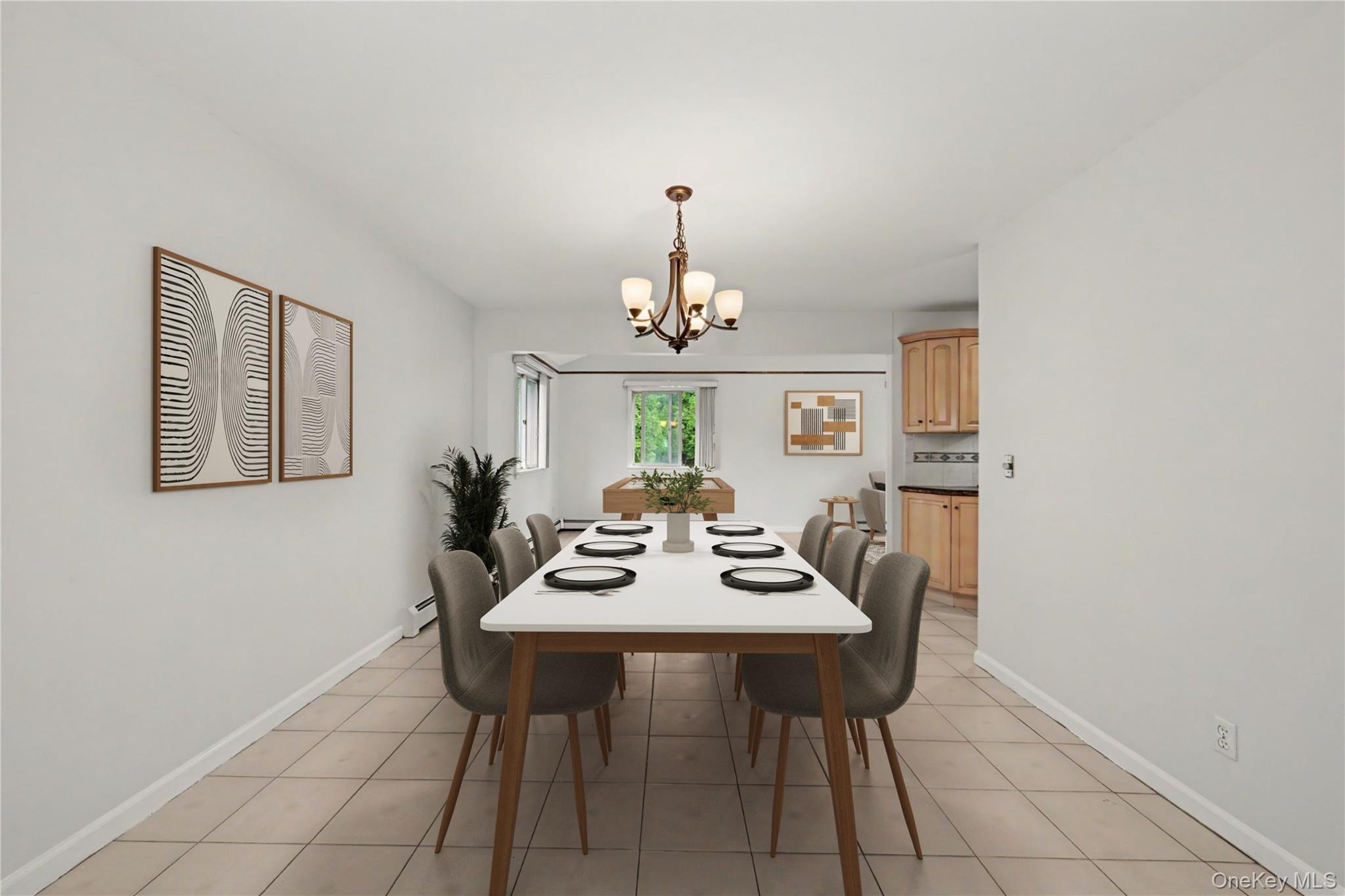 568 Manville Road, Unit UPPER R Pleasantville, NY 10570 - Photo 7 of 32 Virtually staged spacious dining area featuring neutral wall tones and tile flooring