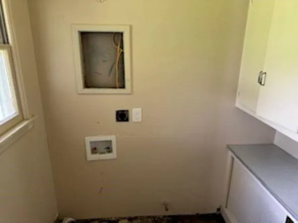 a bathroom with a sink and mirror