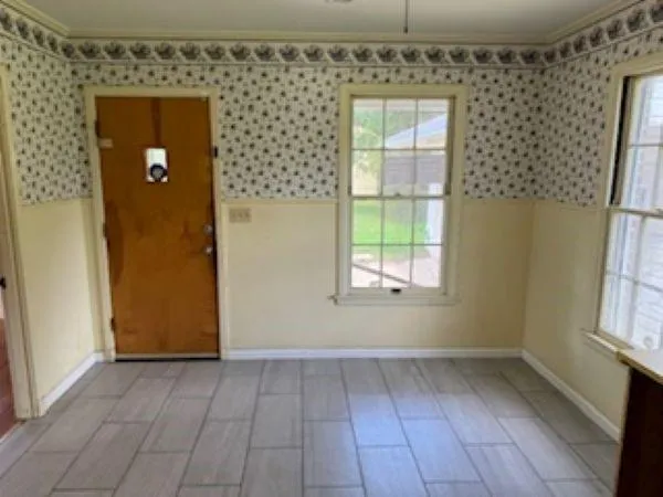 an empty room with windows