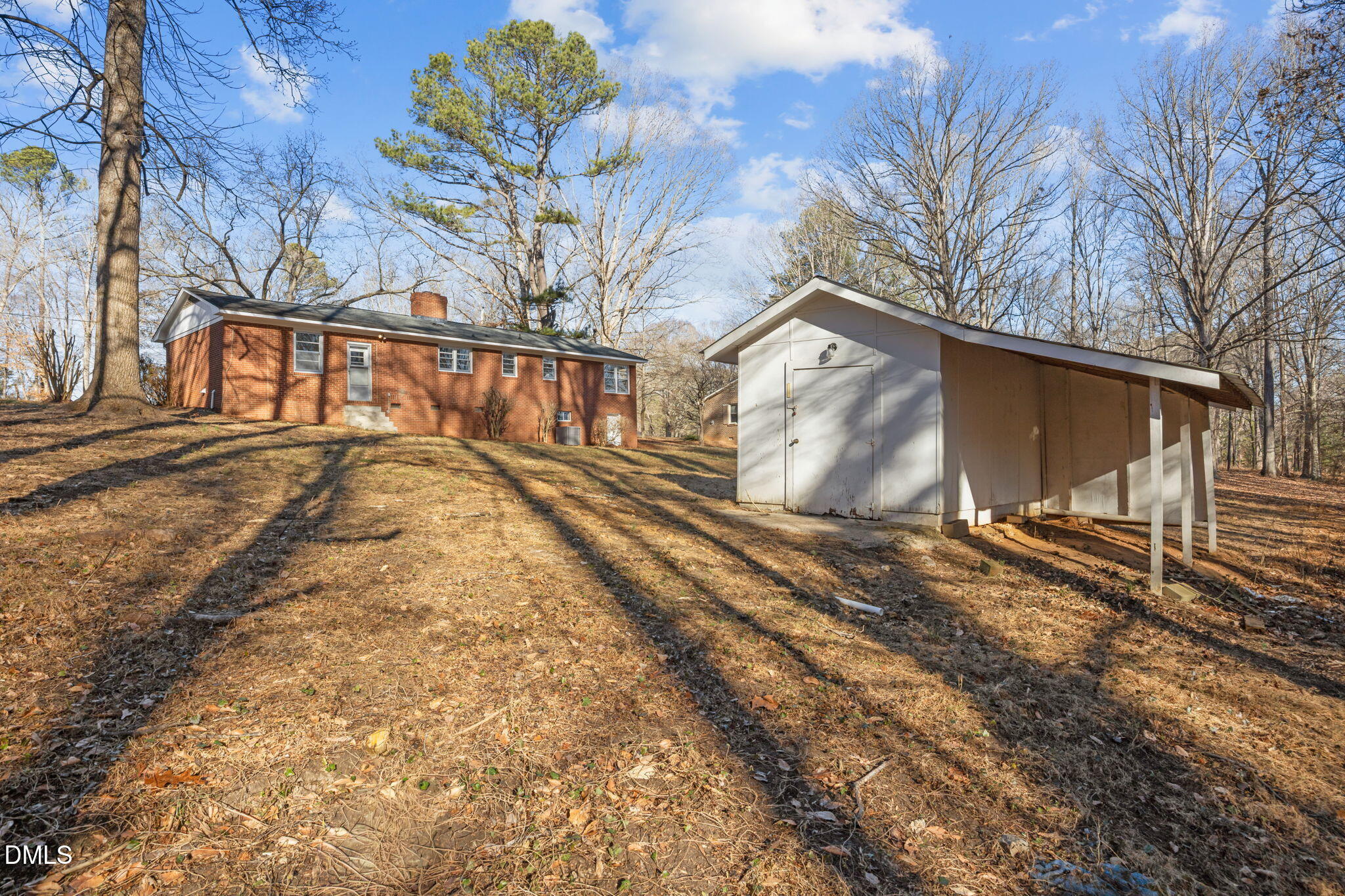 122 Ridgecrest Drive Warrenton, NC 27589 - Photo 13 of 48 a view of a yard with wooden fence