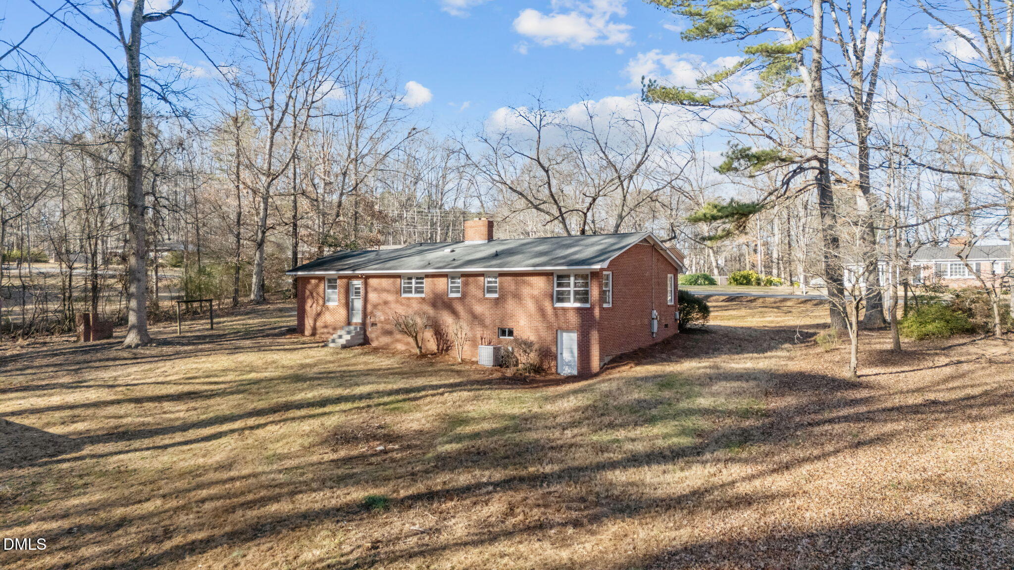 122 Ridgecrest Drive Warrenton, NC 27589 - Photo 19 of 48 a view of a yard with wooden fence