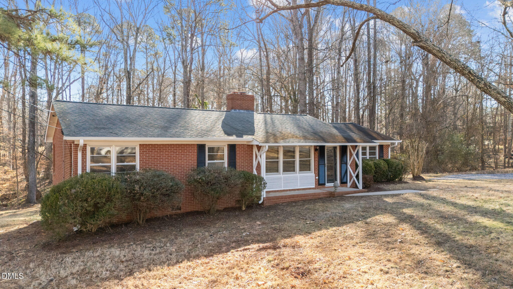 122 Ridgecrest Drive Warrenton, NC 27589 - Photo 2 of 48 a front view of a house with a garden