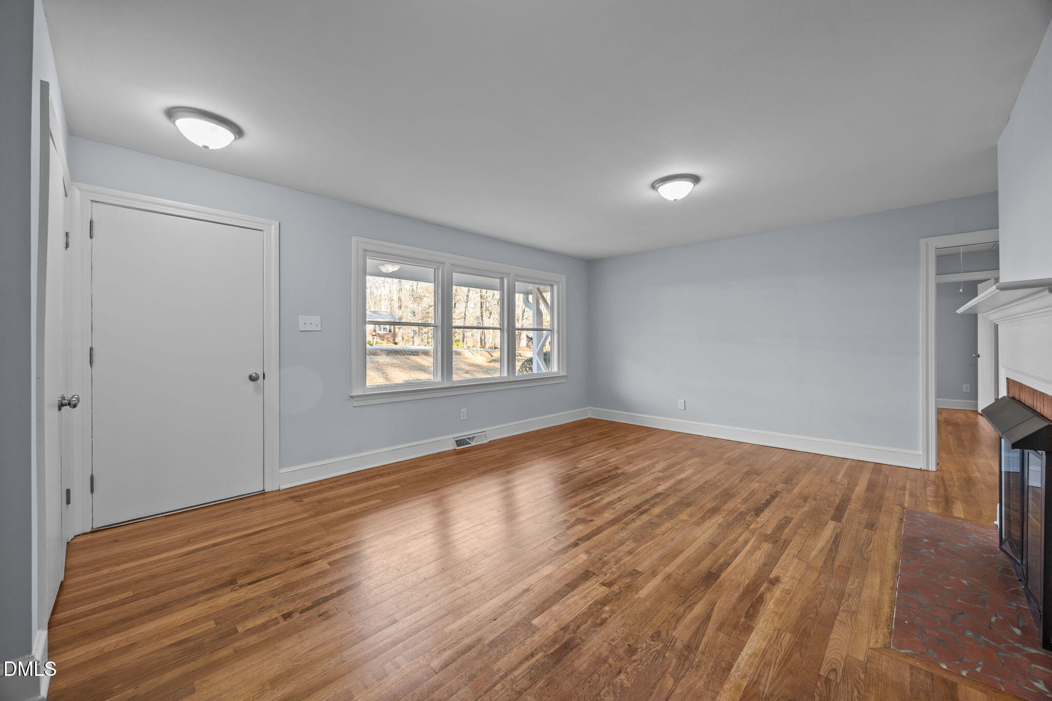 122 Ridgecrest Drive Warrenton, NC 27589 - Photo 24 of 48 wooden floor in an empty room with a window