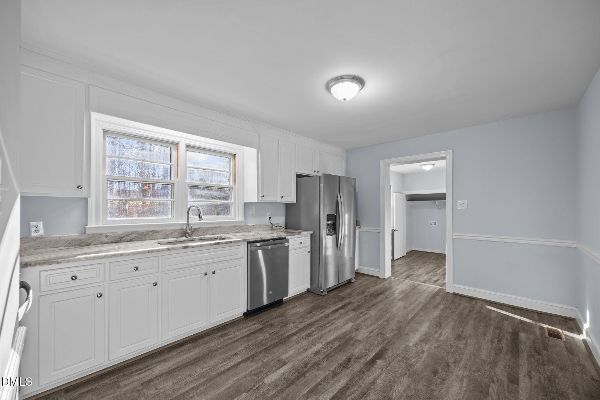 122 Ridgecrest Drive Warrenton, NC 27589 - Photo 27 of 48 a large kitchen with a window and stainless steel appliances