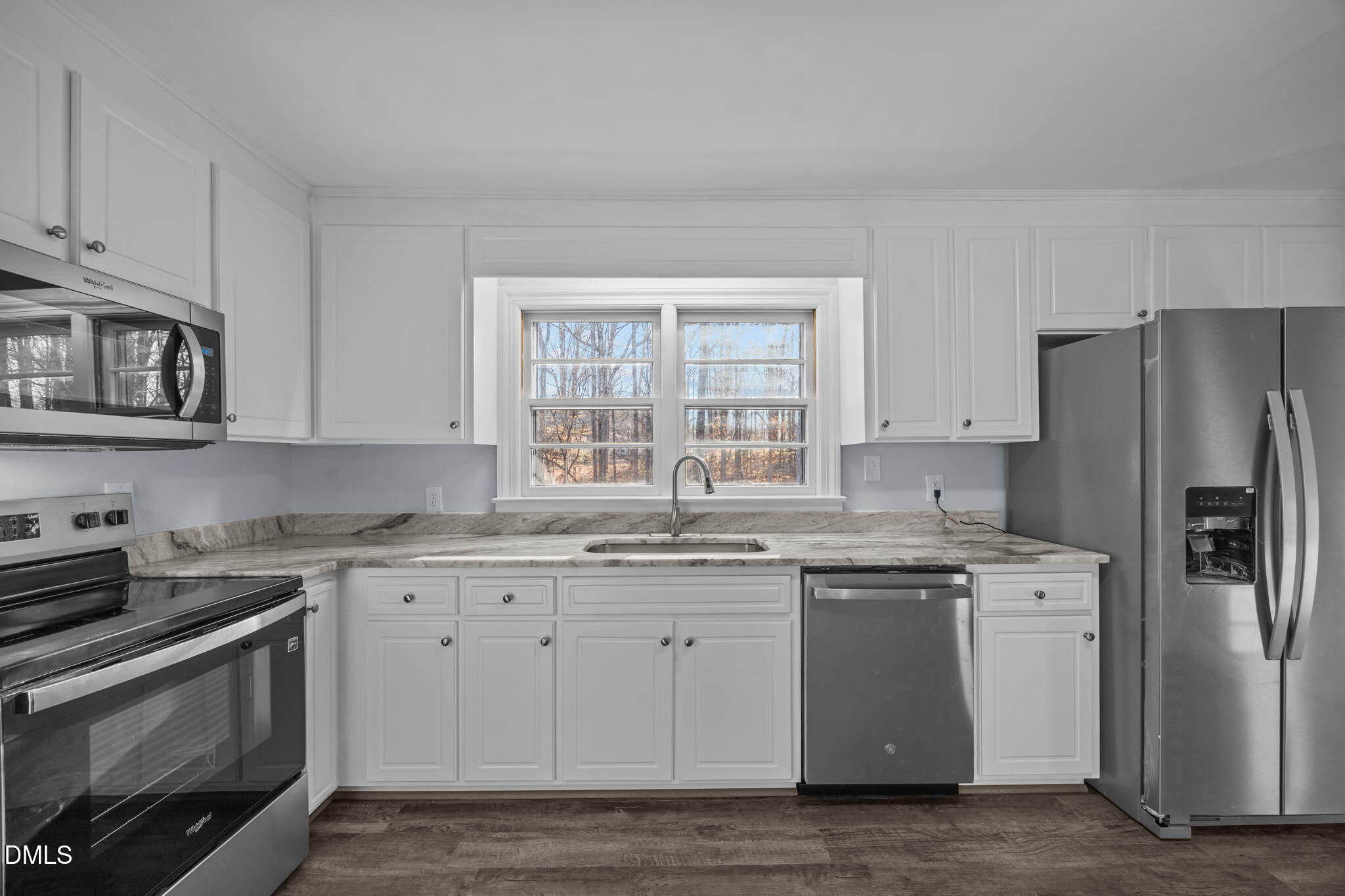 122 Ridgecrest Drive Warrenton, NC 27589 - Photo 28 of 48 a kitchen with a sink stove and refrigerator