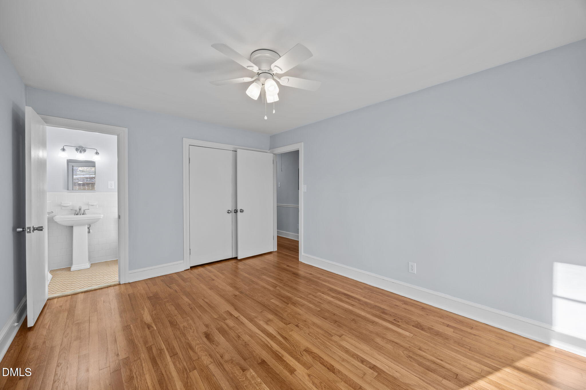 122 Ridgecrest Drive Warrenton, NC 27589 - Photo 32 of 48 a view of an empty room with wooden floor